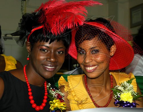 Colin Hamilton/freelance photographer
?
The Bigga Jamaica Oaks "Ladies Day" raceday on Saturday April 25, 2009 at Caymanas Track, was a bevy of beauty, brains, and talent. The grounds infront of the stands in the winners enclosure was awash with colour as the invited celebrities donned their various fashion statements with a finishing touch of hats which were provided by?Marcellas James of Cinderella Hats Ltd. From left Renee Marshall wearing a "Fascinator" hat with Ostritch feathers and Naomi Garrick.