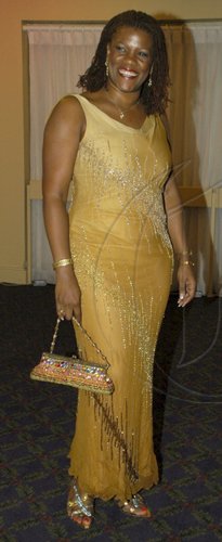 Colin Hamilton/freelance photographer
A very curvy Michelle Wilson-Reynolds (Senior VP - Capital & Credit) at the Jamaica Association of Vintage Artistes & Affiliates (JAVAA) second induction to the Jamaica Music Hall of Fame held at the Pegasus Hotel on Tuesday July 7, 2009.