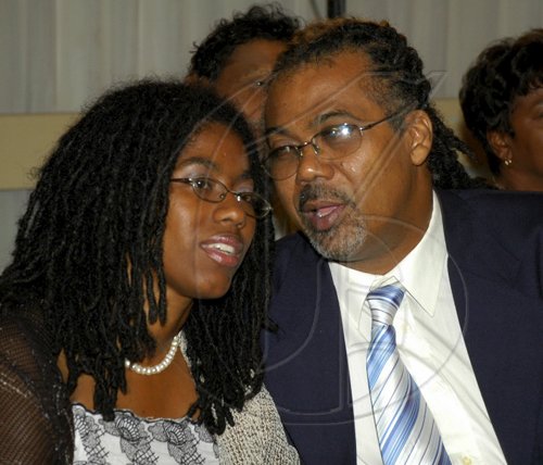 Colin Hamilton/freelance photographer
Wonder what sweet words Patrick Lafayette is whispering to his wife Indi at the Jamaica Association of Vintage Artistes & Affiliates (JAVAA) second induction to the Jamaica Music Hall of Fame held at the Pegasus Hotel on Tuesday July 7, 2009.