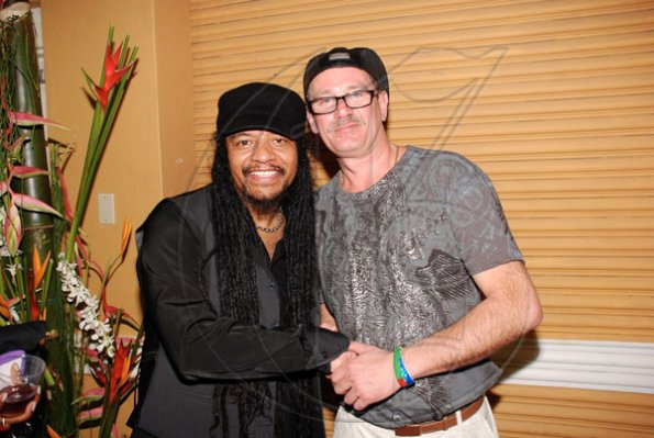 Contributed
Maxi Priest (left) and Joe Roy Jackson greet each other after they performed at Jamaica Jazz and Blues event.

**********************************************************************Prelude? ?Jamming in Sunset Jamaica Grande? on Monday night in Ocho Rios.