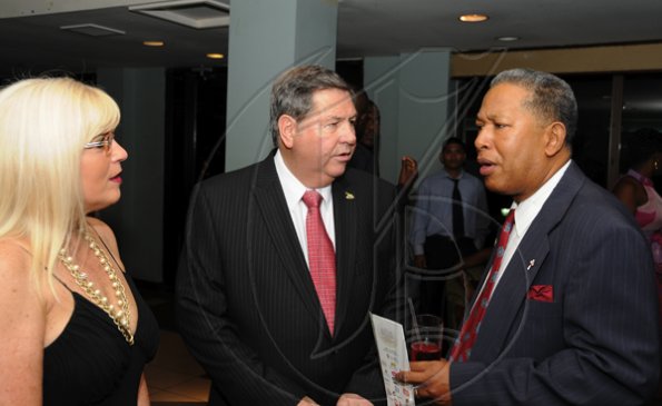 Winston Sill / Freelance Photographer
Jamaica Exporters Association (JEA) Awards Banquet, held at the Wyndham Hotel  on Wednesday night June 29, 2011. Here are Lisa-May Pengelley (left) Drian Pengelley (centre); and David Yee Sing (right).