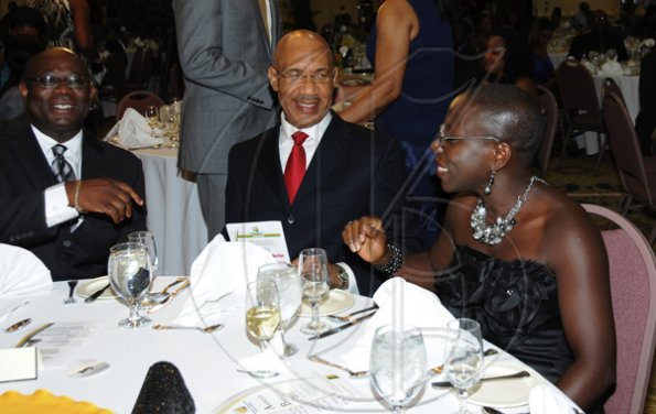 Winston Sill / Freelance Photographer
Jamaica Exporters Association (JEA) Awards Banquet, held at the Wyndham Hotel  on  Wednesday night June 29, 2011. Here are Vitus Evans (left), President, JEA; Governor General Sir Patrick Allen (centre); and Brenda Leon (right).