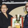 Winston Sill / Freelance Photographer
Jamaica Exporters Association (JEA) Awards Banquet, held at the Wyndham Hotel on Wednesday  night June 29, 2011. Here Winston Stona (right) presents the Model Exporter Trophy to Greta Bogues (left), of J Wray and Nephew.