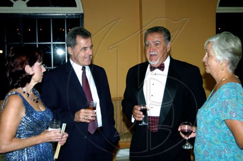 Winston Sill / Freelance Photographer
Jamaicans For Justice (JFJ) in association with Knutsford Court Hotel presents their Gala Dinner, Art and Collectibles Auction, held at Knutsford Court Hotel, Ruthven Road on Friday night June 4, 2010. Here are Cathy Hallihan (left); Stephen Hallihan (second left), Canadian High Commissioner; Errol Zaidie (second right); and Ingrid Zaidie (right).