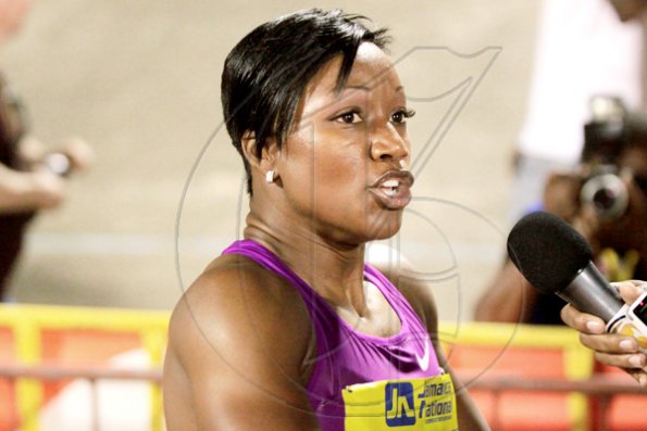 Anthony Minott/Freelance Photographer
The USA's Carmelita Jeter speaks with reporters after winning the women's 100m in 10.94 seconds during the Jamaica National International Invitational athletics meet at the National Stadium, Kingston, on Saturday, May 1, 2010