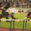 Anthony Minott/Freelance Photographer
USA's Gennie Powell (right) powers to victory in 12.72 seconds in the women's 100m hurdles race during the Jamaica National International Invitational athletics meet at the National Stadium, Kingston, on Saturday, May 1, 2010.