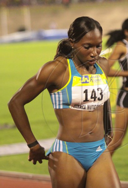 Anthony Minott/Freelance Photographer
Jamaica's Novlene Williams-Millls walks away after winning the women;s 400m event in 50.32 seconds race during the Jamaica National International Invitational athletics meet at the National Stadium, Kingston, on Saturday, May 1, 2010.