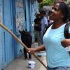 Ricardo Makyn/Staff Photographer.
This  Young Lady is ready with Broom in Hand  in Riversdale on Labour Day in St Catherine on Monday 25.5.2009.