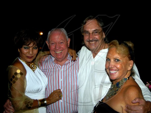 Winston Sill / Freelance Photographer
The Directors of Selective Homes host Cocktail Reception to introduce new housing development, held at Retreat Avenue on Wednesday night November 18, 2009. Here are michelle Bovell (left); Christopher Bovell (second left); Robert Cartade (second right); and Carrole Issa-Cartade (right).