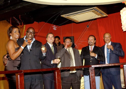 Winston Sill / Freelance Photographer
Supreme Ventures Limited launch party for the "Super Lotto Game", held at Pure Plush Lounge, Trinidad Terrace, New Kingston on Tuesday August 25, 2009. In photo here fromleft are Ann Dawn Young-Sang; Brian George; Erick Dyson; Paul Hoo; Jose B. Guzman; and Elvin Diaz.