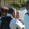 Rudolph Brown/Chief Photographer
One of Luciana baby mother crying for her daughter after a two hour shoot out at the artiste's home with a lone gunman, three policemen were shot and injured at Westminster Crescent in St. Andrew on Wednesday, March 25-2009