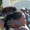 Rudolph Brown/Chief Photographer
One of Luciana baby mother crying for her daughter after a two hour shoot out at the artiste's home with a lone gunman, three policemen were shot and injured at Westminister Crescent in St. Andrew on Wednesday, March 25-2009