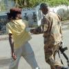 Rudolph Brown/Chief Photographer
A solider arrested a man at Luciana House after a two hour shoot out at the artiste's home with a lone gunman, three policemen were shot and injured at Westminster Crescent in St. Andrew on Wednesday, March 25-2009