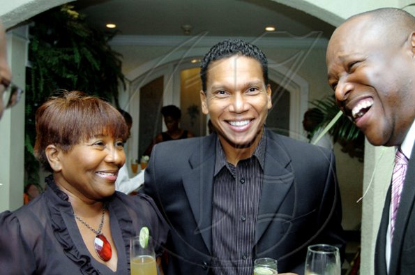 Winston Sill / Freelance Photographer
New LIME Chairman Chris Dehring (centre), is making  the J. Wray and Nephew pair of Marilyn Bennett and Andrew Price crack up at the Appleton Estate dinner and tasting of its new luxury rum, Appleton Estate 30-Year Old Jamaica Rum at the Terra Nova All-Suite Hotel, Waterloo Road on Thursday night.

****************************************************************** November 19, 2009.