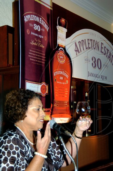 Winston Sill / Freelance Photographer
Master Blender Joy Spence takes her 'class' through the intricacies of rum tasting.

Appleton Estate host Dinner and Tasting of Luxury Rum, held at Terra Nova All-Suite Hotel, Waterloo Road on thursday night November 19, 2009.