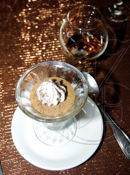 Winston Sill / Freelance Photographer
The naughty chocolate mousse with the Appleton Estate 21-Year Old Jamaica Rum.

****************************************************************************

Appleton Estate host Dinner and Tasting of Luxury Rum, held at Terra Nova All-Suite Hotel, Waterloo Road on thursday night November 19, 2009.