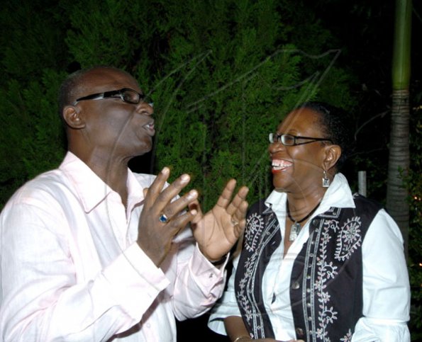 Winston Sill / Freelance Photographer
Director of Public Prosecutions Paula Llewellyn (right) elicits a comical reaction from Mayor of Kingston, Desmond McKenzie at his party.

host "Mayor's Appreciation Party", held at Eden Gardens, Lady Musgrave Road on Wednesday night December 30, 2009.