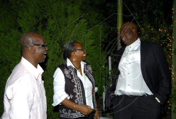 Winston Sill / Freelance Photographer
A rather spiffy Superintendent Derrick 'Cowboy' Knight (right) joins the conversation with Mayor of Kingston, Desmond McKenzie and Director of Public Prosecutions Paula Llewellyn.
 host "Mayor's Appreciation Party", held at Eden Gardens, Lady Musgrave Road on Wednesday night December 30, 2009.
