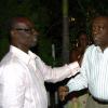 Winston Sill / Freelance Photographer
Mayor of Kingston, Desmond McKenzie (left) escorts friend and fellow 'Labourite' Derrick Smith into the party. McKenzie took over from Smith as a deputy leader of the JLP last year.

host "Mayor's Appreciation Party", held at Eden Gardens, Lady Musgrave Road on Wednesday night December 30, 2009.