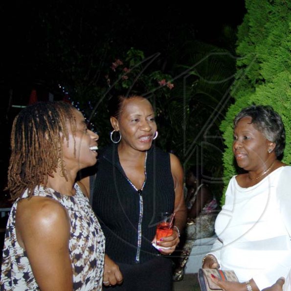 Winston Sill / Freelance Photographer
Marcia McKenzie (right), wife of the mayor, raps with the Francis sisters Colette (left) and Andrea at the mayor's party.

********************************************************************


Mayor of Kingston and St Andrew, Desmond McKenzie host "Mayor's Appreciation Party", held at Eden Gardens, Lady Musgrave Road on Wednesday night December 30, 2009.