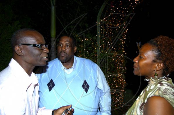 Winston Sill / Freelance Photographer
Mayor of Kingston, Desmond McKenzie (left) chats with popular cop Cornwall 'Bigga' Ford and his wife Delores.

host "Mayor's Appreciation Party", held at Eden Gardens, Lady Musgrave Road on Wednesday night December 30, 2009.