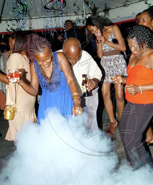 Winston Sill / Freelance Photographer
The dance floor, complete with the party fog, was never devoid of partygoers.

***************************************************************************
Mayor of Kingston and St Andrew, Desmond McKenzie host "Mayor's Appreciation Party", held at Eden Gardens, Lady Musgrave Road on Wednesday night December 30, 2009.