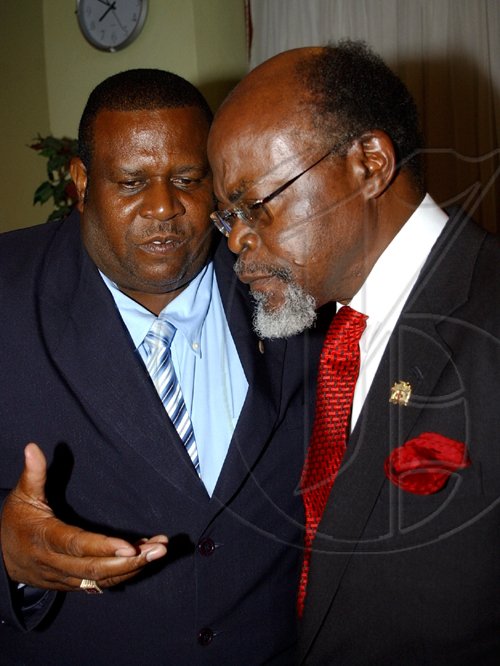 Winston Sill / Freelance Photographer
Mayor Desmond McKenzie host Welcome Reception for  delegates to the Intercity Intangible Cultural Cooperation Network (ICCN), Local Government International Conference, held at Knutsford Court Hotel on Monday September 14, 2009. Here are Mayor Keith Hinds (left); and Earl Witter (right)  Public Defender.