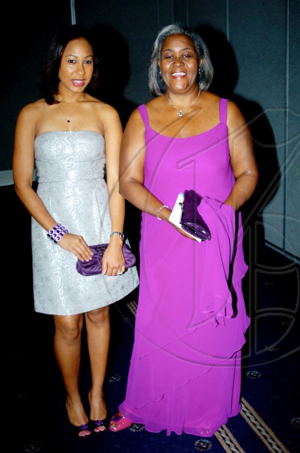 Winston Sill / Freelance Photographer
Martina Powell (left), with mom-in-law to be Marva Christian were out to support family patriarch Glen Christian, one of the gold medal awardees.

****************************************************Mico University Alumni Association (MOSA) presents the Biennial Gold Medal Awards Banquet, held at the Jamaica Pegasus Hotel, New Kingston on Saturday night April 17, 2010.