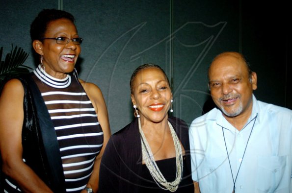 Winston Sill / Freelance Photographer
From left: Sonia Hamilton, Pat Ramsay and Father Gregory Ramkissoon are in a happy mood.

****************************************************************************Mico University Alumni Association (MOSA) presents the Biennial Gold Medal Awards Banquet, held at the Jamaica Pegasus Hotel, New Kingston on Saturday night April 17, 2010.