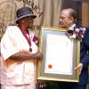 Peta-Gaye Clachar/Freelance Photographer
The Most honourable Edward Seaga presents Mrs. Rhona Welsh with a bronze medal and citation for her contribution to needlecraft at the Institute of Jamaica (IOJ) Musgrave Awards ceremony at IOJ on Wednesday, October 14, 2009.