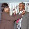 Peta-Gaye Clachar/Staff Photographer
Minister Youth Sports and Culture Olivia 'Babsy' Grange present the Musgrave Gold Medal to Colonel Sidney Peddi  for his contribution to the Maroons at the Institute of Jamaica Musgrave Medals Awards Ceremony at the Institute of Jamaica on Thursday, May 28, 2009.