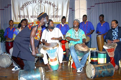 Peta-Gaye Clachar/Staff Photographer
Members of the Akwaaba Drummers took the audience back to their roots while at the Institute of Jamaica Musgrave Medals Awards Ceremony at the Institute of Jamaica on Thursday, May 28, 2009.