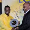 Winston Sill / Freelance PhotographerCrichton Automotive won the Used Car Dealer of the Year (2009/2010) and Jermaine Blair (left) accepts the award from Dennis Cohen, deputy group managing director of National Commercial Bank.*********************************************************(NCB) Auto Dealers Awards Ceremony, held at Terra Nova All-Suite Hotel, Waterloo Road on Tuesday night April 5, 2011.