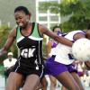 Peta-Gaye Clachar/Staff Photographer
Jamalco goalkeeper Nicole Aiken (left) and Walgrovians goalshooter Christina Salmon collide during game two of the JNA/Berger Paints netball final at the Leila Robinson courts yesterday.  Jamalco won 50-46 to tie the three-game series 1-1.