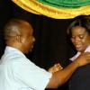 Colin Hamilton/Freelance Photographer
 Press Association of Jamaica president, Byron Buckley pins Yahneake Sterling at the second Corporate Area induction ceremony held at the Public Broadcasting Corporation of Jamaica (PBCJ) on Wednesday.

*********************************************************************************** June 17, 2009.
