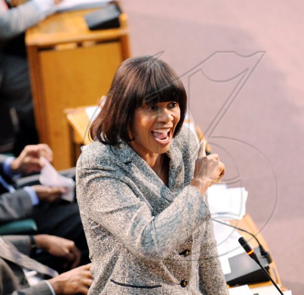 Ricardo Makyn/Staff Photographer
Opposition Leader Portia Simpson Miller rebuked the prime minister in Parliament Tuesday for questioning the character of the Opposition en bloc.

Manatt Phelps and Phillips prsentation at Parliament on Tuesday 11.5.2010.
