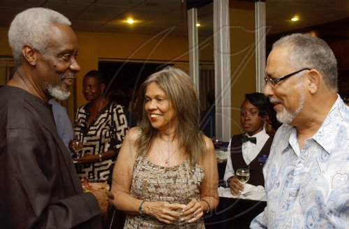 Winston Sill / Freelance Photographer
Professor Marlene Hamilton and husband Howard Hamilton (right) hobnob with the celebrant, former Prime Minister P.J. Patterson at the reception to commemorate his Caricom Award, held at the Jamaica Pegasus Hotel, New Kingston on Monday July 27, 2009.