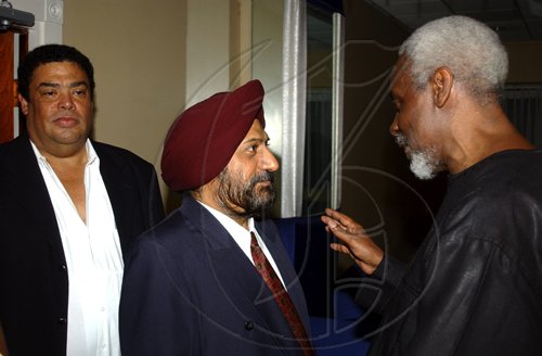 Winston Sill / Freelance Photographer
Former Prime Minister P.J. Patterson (right) welcomes Indian High Commissioner Mohinder Singh Grover (centre) while Carib Cement boss Anthony Haynes waits in line.

for his Caricom Award, held at the Jamaica Pegasus Hotel, New Kingston on Monday July 27, 2009.