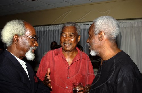 Winston Sill / Freelance Photographer
Maitland Richards (left), sporting a similar hairstyle to P.J. Patterson (right) joins in the conversation with Milton Weise at the reception for Patterson to celebrate his Caricom Award, held at the Jamaica Pegasus Hotel, New Kingston on Monday July 27, 2009.