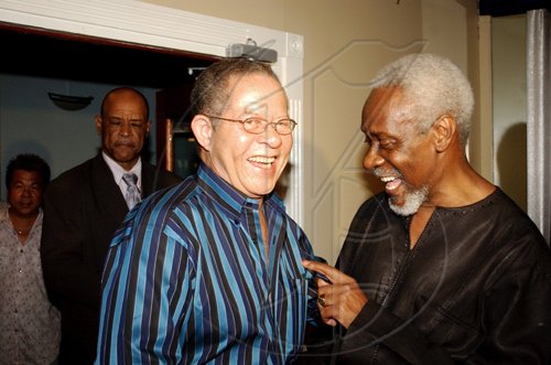 Winston Sill/Freelance Photographer
Talk about being tickled pink; seems like Prime Minister Bruce Golding (left) and former prime minister P. J. Patterson are having the time of their lives at the reception to honour the latter for  his Caricom Award, at the Jamaica Pegasus Hotel, New Kingston on Monday July 27.