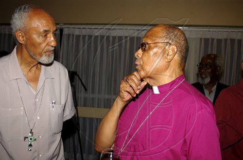 Winston Sill / Freelance Photographer
Ensuring the blessings come down are Archbishop Donald Reece (left) and Bishop Alfred Reid at the reception for former Prime Minister PJ Patterson for his Caricom Award, held at the Jamaica Pegasus Hotel, New Kingston on Monday July 27, 2009.