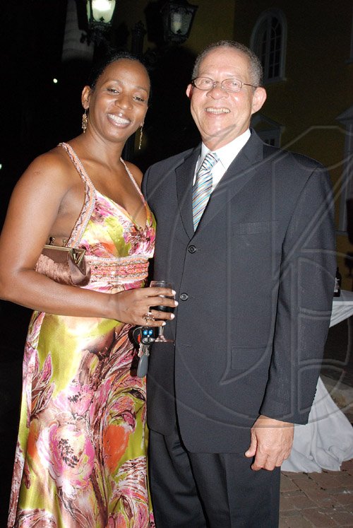 Janet Silvera Photo
Our always dapper Prime Minister Bruce Golding makes time for the cameras with Digicel's Joy Clark.

************************************************************************* at the Pioneers of Prosperity Awards ceremony at the Half Moon in Montego Bay last Friday night.