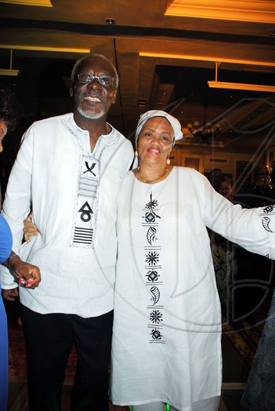 Janet Silvera
P.J. Patterson and Faith Thomas look like they spied in each other's closets before making these fabulous wardrobe choices.

*******************************************************************Ghanaians in their African ensemble.