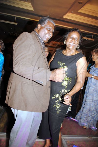Janet Silvera

Dr. Vin Lawrence caught in a rare mood - dancing up a storm with wife... at PJ's party at RIU Ocho Rios.