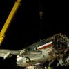 Winston Sill / Freelance Photographer
Removal of crash American Airlines aircraft from the crash site, off Port Royal Road, on Monday night December 28, 2009. Winston Sill / Freelance Photographer
Removal of the middle section of the  crashed  American Airlines aircraft from the crash site, off Port Royal Road, on Monday night December 28, 2009.