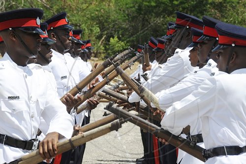Ian Allen/Photographer
The latest batch of Jamaica Constabulary Force graduates participate in a passing-out parade at the Jamaica Police Academy in Twickenham Park,  St Catherine yesterday.
