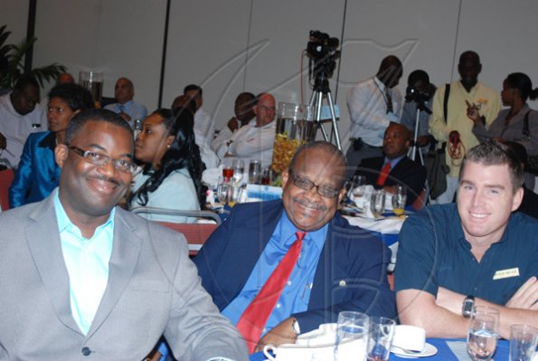 Janet Silvera
Powerful businessmen of Montego Bay from L- LIME's Leroy Reid, Montego Bay Chamber of Commerce president, Lloyd B Smith and Hilton Rose Hall Resort and Spa's Peter Meyer - smile for the cameras at the first in a series of bi-monthly PSOJ and Coporate Connection Chairman's Forum Breakfast at the Hilton Rose Hall in Montego Bay on Tuesday morning.