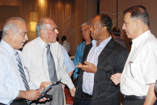 Janet Silvera Photo
 
From L- Kishim Samtani, Allan Daswani, Fred Smith and Ashook Mulchandani clearly talking business the PSOJ and Corporate Connections Chairman's Forum breakfast at the Hilton Rose Hall Resort and Spa in Montego Bay on Tuesday morning.