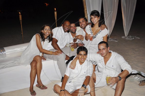 Janet Silvera Photo
 
From L- Seated front row: Ankit Kripalani and Sascha Samtani. From L: Back row: Poonam Uttam, Sam James Jr., Mike Puschell, Ranjeet and Madhu Mahtani at Rajeesh Kripalani's 40th birthday party at Cornwall Beach in Montego Bay last Saturday night.
