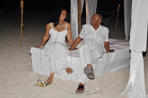 Janet Silvera Photo
 
Look how cozy these two are - Ann Chen and Stephen Euker looked lovely in white at Rajeesh Kripalani's 40th birthday party at Cornwall Beach in Montego Bay last Saturday night.